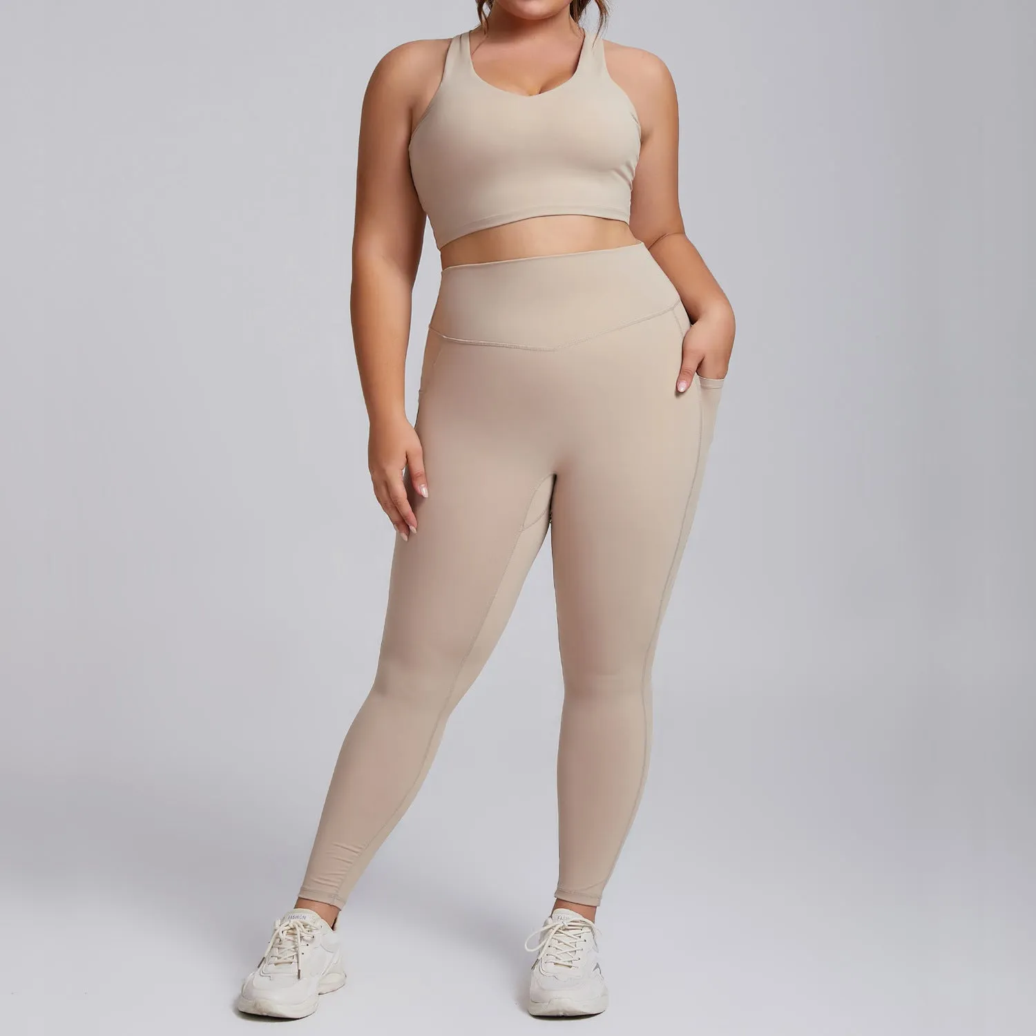 Plus-size women's activewear nude shampooed high-waisted yoga suit