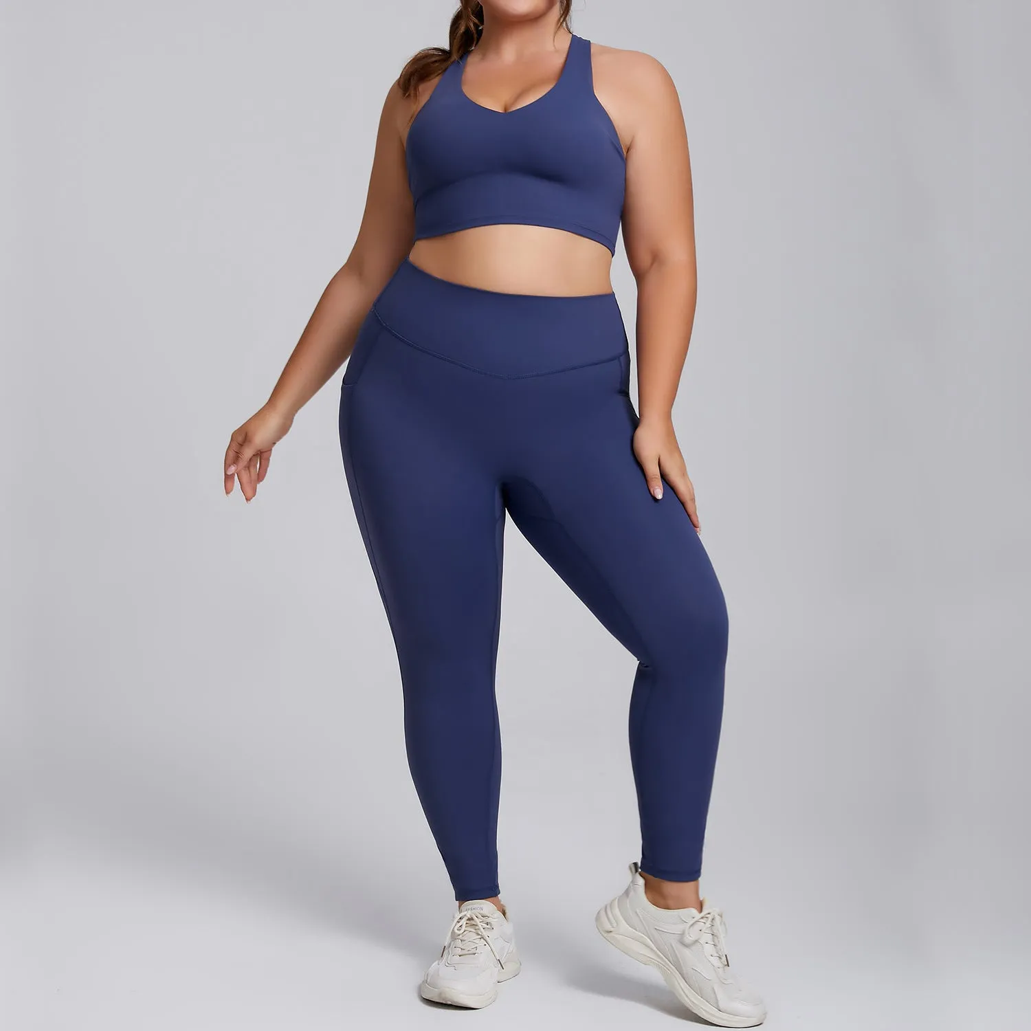 Plus-size women's activewear nude shampooed high-waisted yoga suit