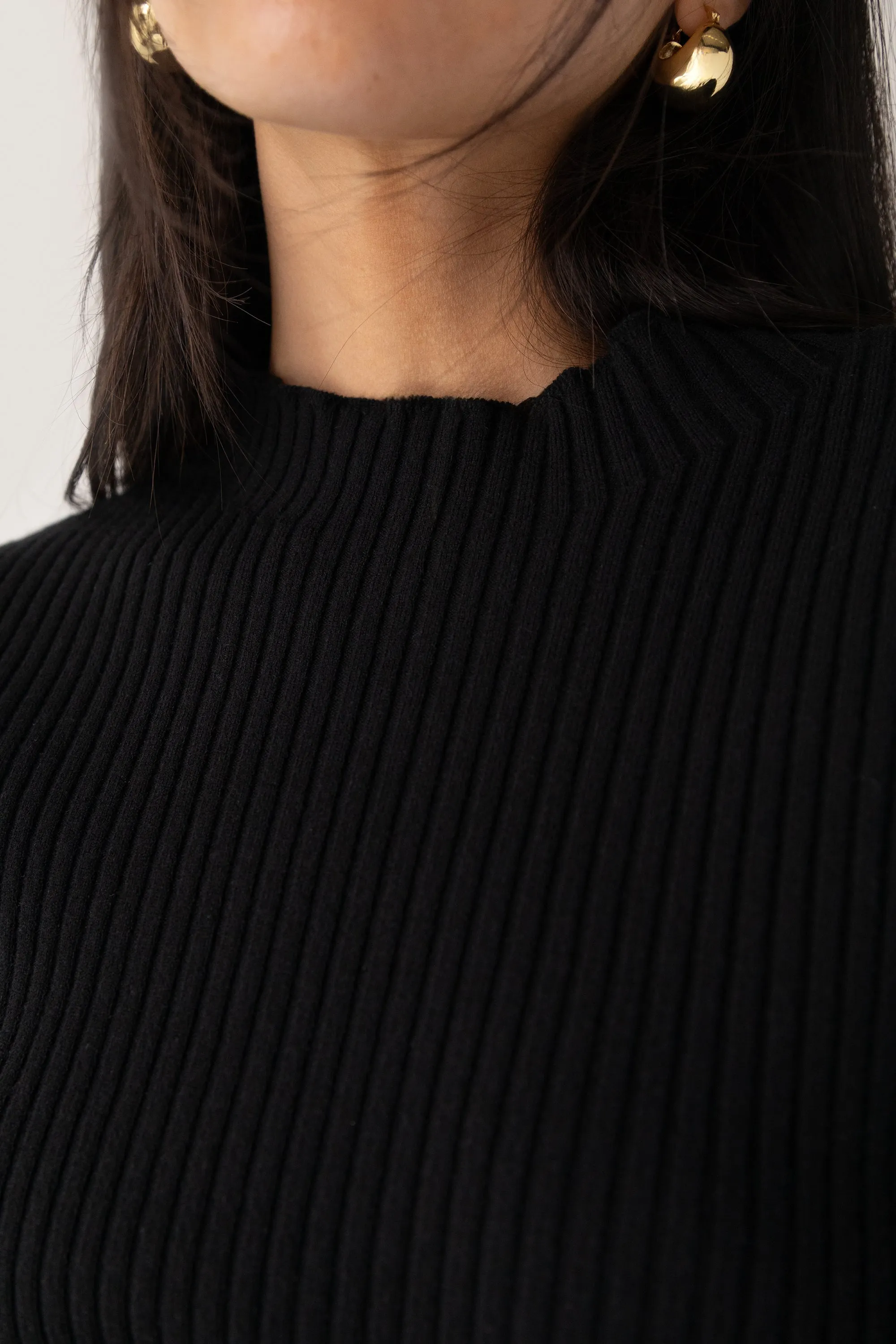 RIBBED SWEATER WITH TIE-BACK DESIGN